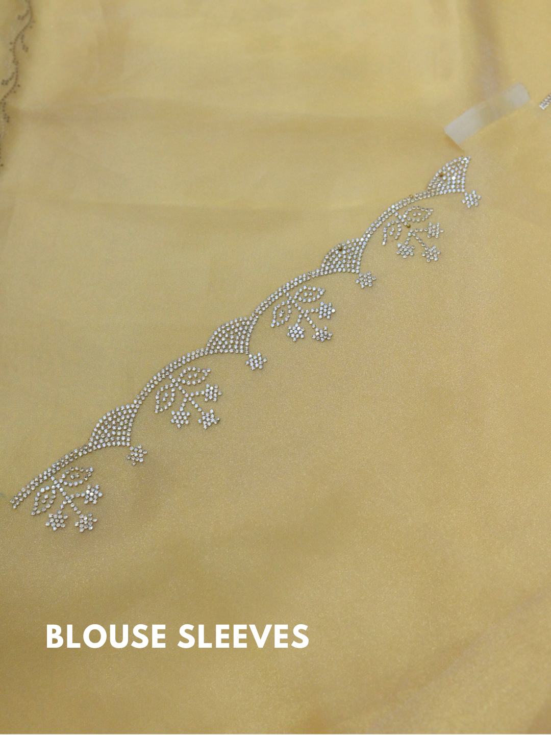 Designer Golden Jimmy Choo Organza Silk Saree by Zaridhaga